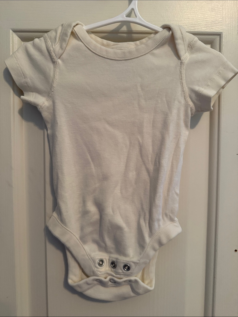 Hanna Andersson Cream Short-Sleeve Baby Bodysuit